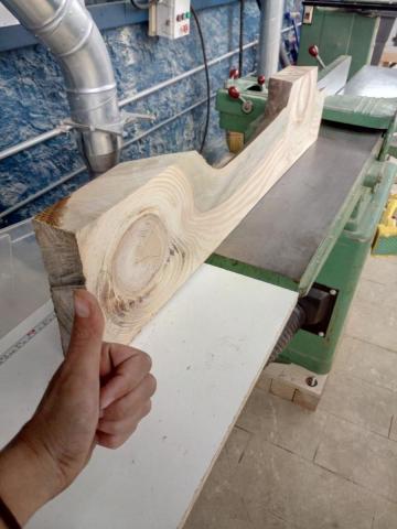 The face jointed side w/ the edge joint on the table