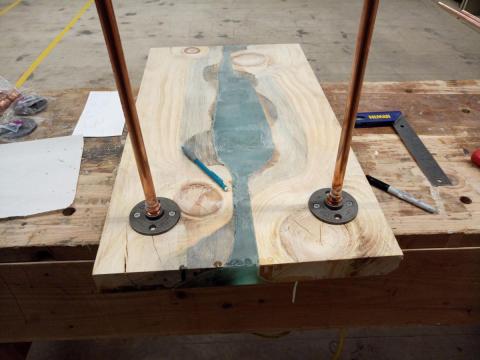 Pipes attached to Table top