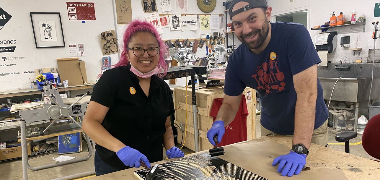 Two makers work in MakeHaven's printmaking area